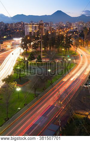 Traffic Light Trails In A Residential Neighborhood At Las Condes District, Santiago De Chile