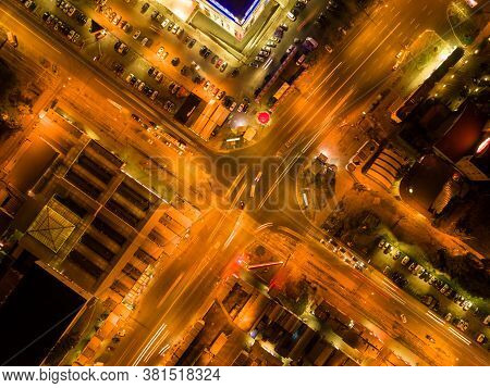 Directly Abobe Aerial View To Crossroads With Car Lights, City Lights With Long Exposure. Kharkiv, U