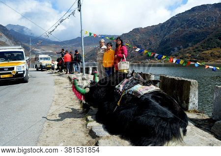 Nathu La, Sikkim, India, 19  October,  2018:   An Indian Tourist Family Of Father, Mother And Son Po