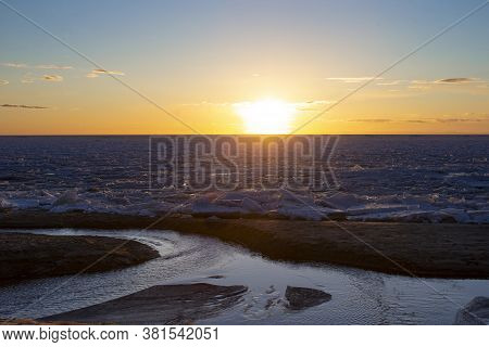 Spring Sunset Over The Melting Ice Of The Gulf Of Bothnia