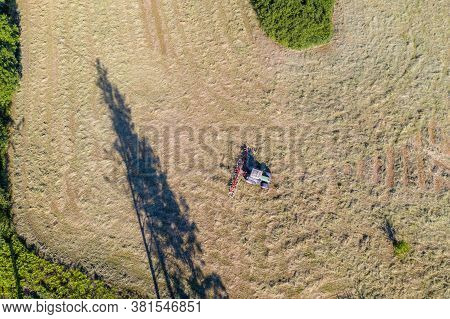 Top View Of Tractor With Tedders, Drying Mowed Hay