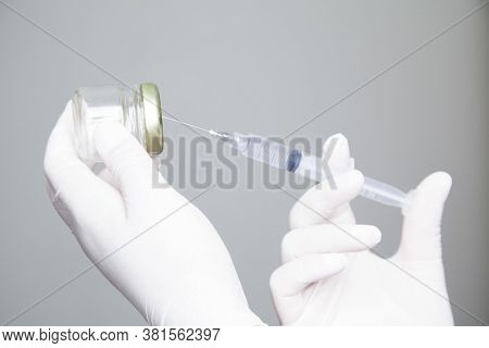 Syringe With Vaccine\preventing The Coronavirus Or Covid-19 Pandemic