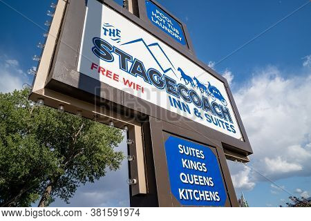 Dubois, Wyoming - July 26, 2020: Sign For The Stagecoach Inn And Suites, A Hotel In Downtown Dubois,