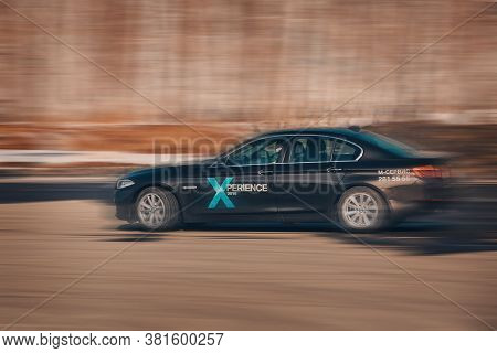 Bmw Advertising, Moscow, 1.11.2018: Demonstration Of A Model Of A Black Car, Cars On A Test Track, D