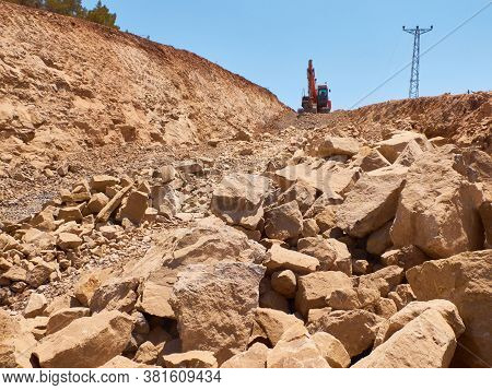 Rock Boulders On The Rocky Soils During Road Construction