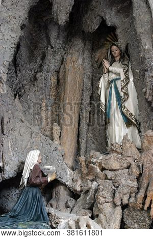 NOVALJA, CROATIA - SEPTEMBER 29, 2013: Altar of Our Lady of Lourdes, altar in the parish church of St. Catherine of Alexandria in Novalja, Croatia