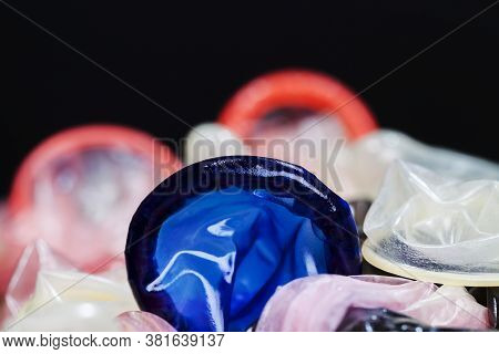 High-quality Blue Latex Condom, A Means To Prevent Pregnancy And Infection, Close-up And Small Depth