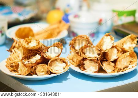 Yellow Waffle Rolls With White Curd Cream