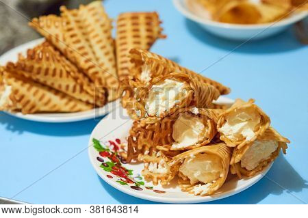 Yellow Waffle Rolls With White Curd Cream