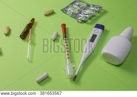 Medication For Seasonal Deseases On Vivd Green Background