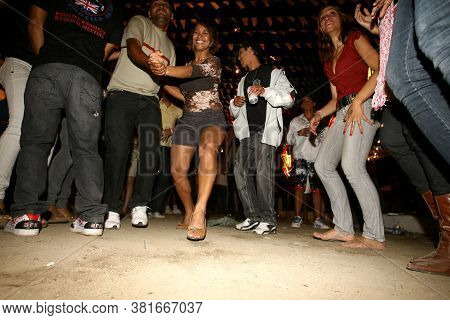 Ilheus, Bahia / Brazil - June 23, 2011: People Are Seen Dancing Forro And Hillbilly Dresses During S
