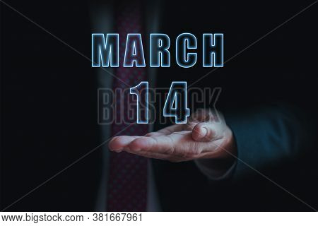 March 14th. Day 14 Of Month, Announcement Of Date Of Business Meeting Or Event. Businessman Holds Th