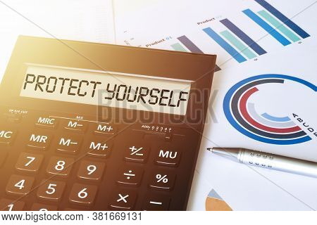 Word Protect Yourself On Calculator. Business And Finance Concept.