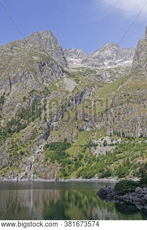Mountains Over The Green Lauvitel Lake In Parc Des Ecrins