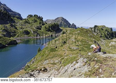 A Long Blue Lake In The Mountains