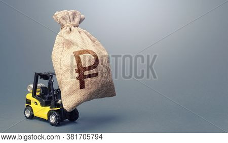 Forklift Carrying A Russian Ruble Money Bag. Strongest Financial Assistance, Business Support. Anti-