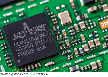 Timisoara, Romania - April 05, 2020: Close-up Of A Broadcom Bcm4318kfbg 802.11g Chip. Electronic Com