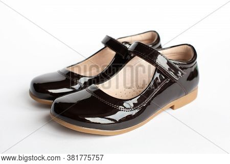 Childrens Classic Leather School Shoes For A Girl, School Uniform Isolated On A White Background.