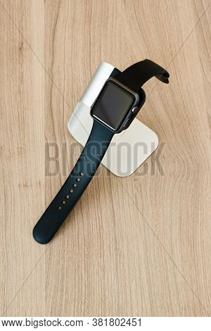 Ostfildern, Germany - May 21, 2015: An Apple Watch Sport 42mm With Space Gray Aluminium Case And Bla