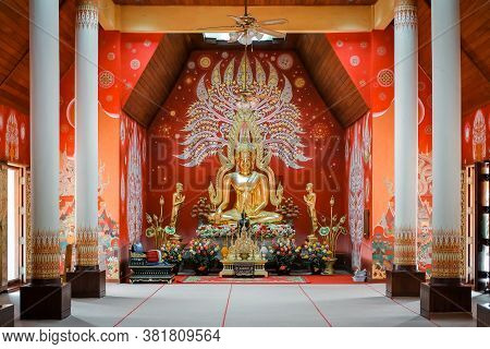 Phayao, Thailand - August 18 2020: Gold Buddha Statue At Chapel In The Pool At Wat Si Khom Kham, Pha