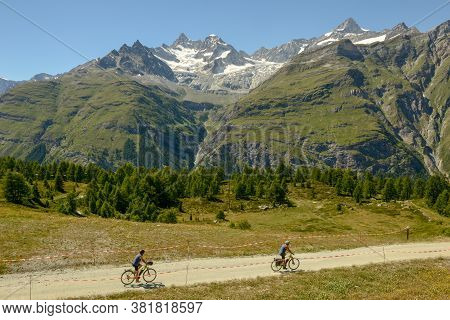 Zermatt, Switzerland - 21 June 2020: People Riding Bikes At Sunnegga Over Zermatt In The Swiss Alps