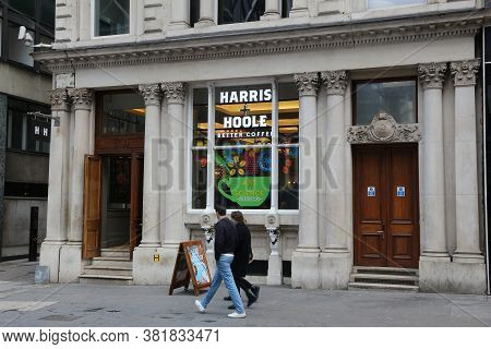 London, Uk - April 23, 2016: People Walk By Harris & Hoole Coffeehouse In London. It Is A Chain Serv