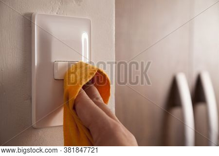 Cleaning The Room Light Switch Coronavirus Prevention