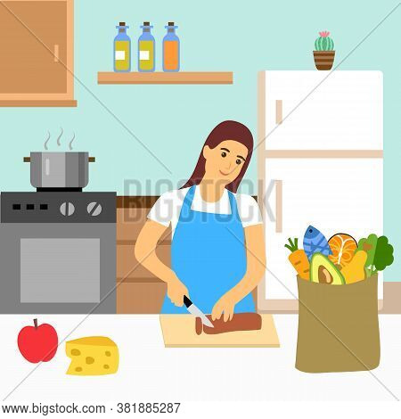 Young Woman Enjoy Cooking In The Kitchen. She Is Slicing Meat And Preparing Dinner For Her Family. K