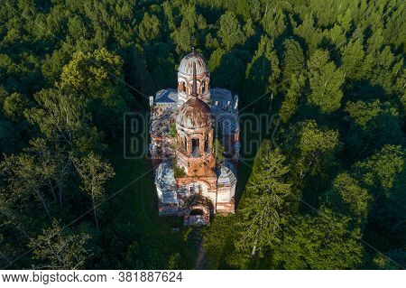 Old Abandoned Trinity Church In A Summer Forest (aerial Photography). Novgorod Region, Russia