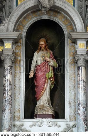 NOVALJA, CROATIA - SEPTEMBER 29, 2013: The altar of the Sacred Heart of Jesus, altar in the parish church of St. Catherine of Alexandria in Novalja, Croatia