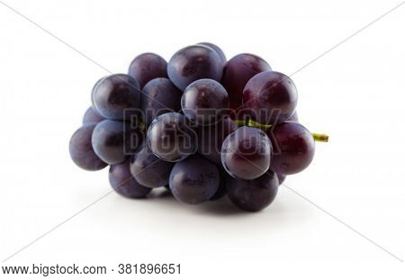 Kyoho grapes (giant mountain grapes) isolated on white. 