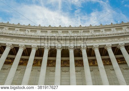 Piazza Venezia Monument In Rome, Italy Under Blue Sky