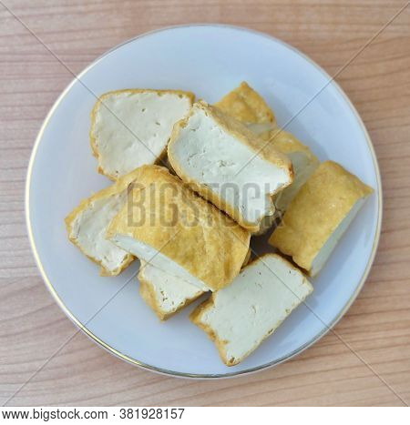 Cuisine And Food, Top View Of Chinese Deep Fried Tofu Or Fried Bean Curd Usually Served With Sweet A