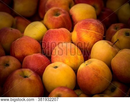 Background Of Red Apples For Sale In The Greengrocers Shop