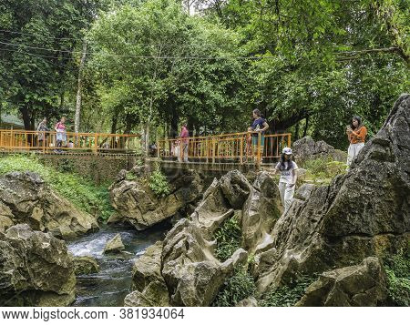 Vangvieng/lao-10 Dec 2017:unacquainted Local Walking On The Nature Trail At Tham Chang Cave Vangvien