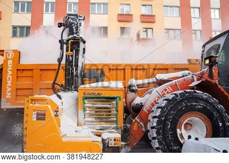 Norilsk, Russia - March 23, 2020: Closeup Of The Snow Impeller Of An Orange Snow Blower.