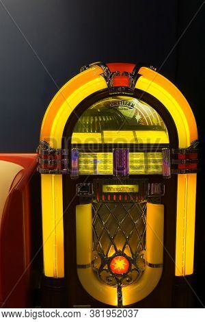Oklahoma Usa - September 10 2015; Brightly Illuminated Jukebox On Dark Background