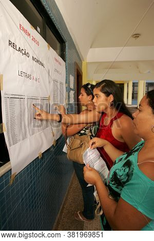 Eunapolis, Bahia / Brazil - November 6, 2010: People Look At Attendance List For Exams Of The Nation
