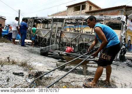 Porto Seguro, Bahia, / Brazil - December 1, 2011: Bus Hardware Set On Fire By Members Of A Criminal 