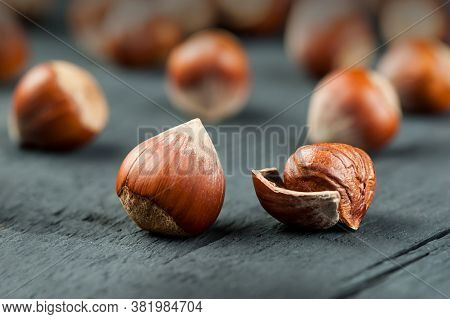 Hazelnuts, Filbert On Wooden Table. Heap Or Stack Of Hazel Nuts. Hazelnut Background, Healty Food