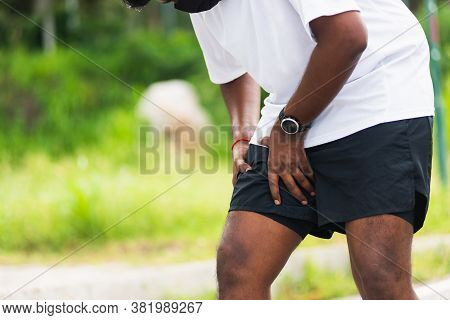 Close Up Asian Young Sport Runner Black Man Wear Watch Hands Joint Hold Leg She Has Thigh Pain While