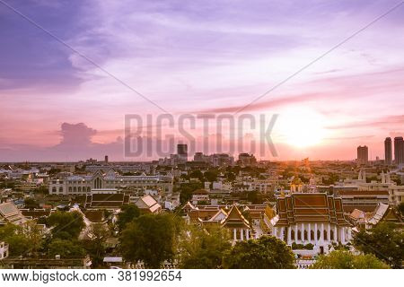 Aerial View Of Bangkok, Bangkok City Downtown With Sunset Sky, Saw The Small Buildings And The Tall 