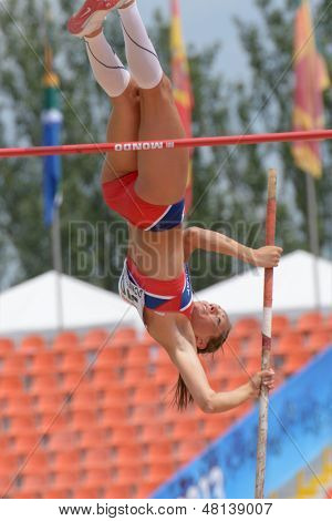 DONETSK, UKRAINE - JULY 11: Lene Onsrud Retzius of Norway competes in Pole Vault during 8th IAAF World Youth Championships in Donetsk, Ukraine on July 11, 2013