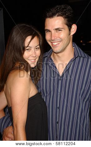 Jason Cook and friend at the Los Angeles Premiere of 