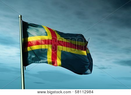 Aland Islands flag waving in the evening