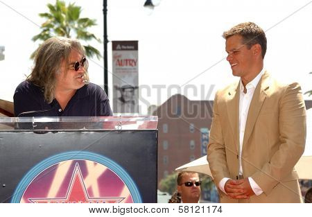 Paul Greengrass and Matt Damon at the award ceremony honoring Matt Damon with a star on the Hollywood Walk of Fame. Hollywood Blvd., Hollywood, CA. 07-25-07