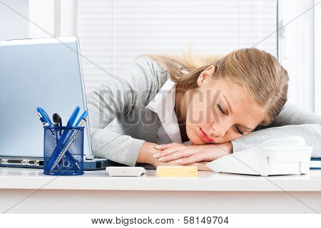 Tired businesswoman