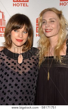Milla Jovovich and Carmen Hawk  at the Los Angeles Debt of Jovovich-Hawk. Stoli Hotel, Hollywood, CA. 05-14-07
