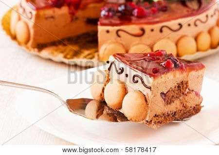 Delicious Slice Of Cake On Metallic Server Spoon