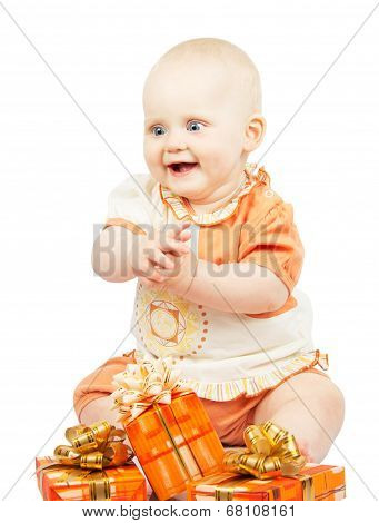 Rapt baby with festive gifts